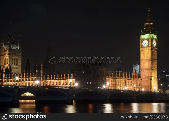 Houses of Parliament, Big Ben and Westminster Bridge at night in London