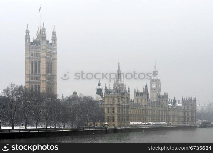 Houses of Parliament Building and Big Ben, Westminster, London, England, on a cold, snowy, Winter&rsquo;s day.