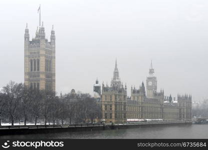 Houses of Parliament Building and Big Ben, Westminster, London, England, on a cold, snowy, Winter&rsquo;s day.