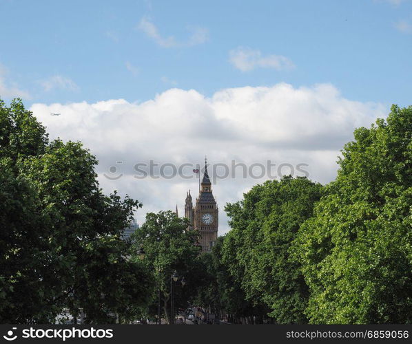 Houses of Parliament in London. Houses of Parliament aka Westminster Palace seen from Victoria Embankment in London, UK