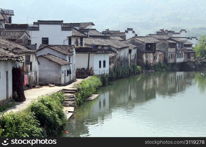 Houses on the river bank in Shexian town, China