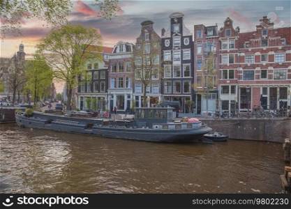houses on the water on the canals of the city of Amsterdam. Netherlands