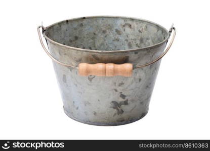 Houseware: old, time-worn, rusty zinc-coated bucket, isolated on white background. Zinc-coated bucket