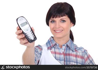 housewife holding a cell phone
