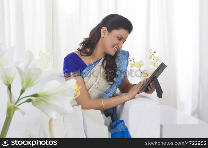 Housewife looking at a photograph