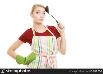 housewife or cook chef in striped kitchen apron with ladle isolated studio shot