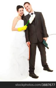 Housework concept. Humorous funny couple bride groom in domestic role, sharing household chores. Isolated on white background.