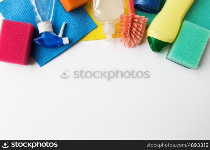 housework, housekeeping and household concept - cleaning stuff on white background