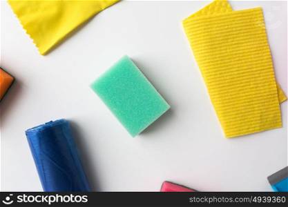 housework, housekeeping and household concept - cleaning stuff on white background. cleaning stuff on white background