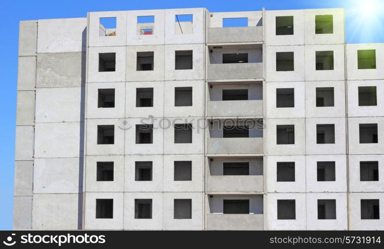 housing construction against a blue sky