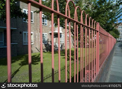 Housing estate and railings, London, Darlan Road, Fulham