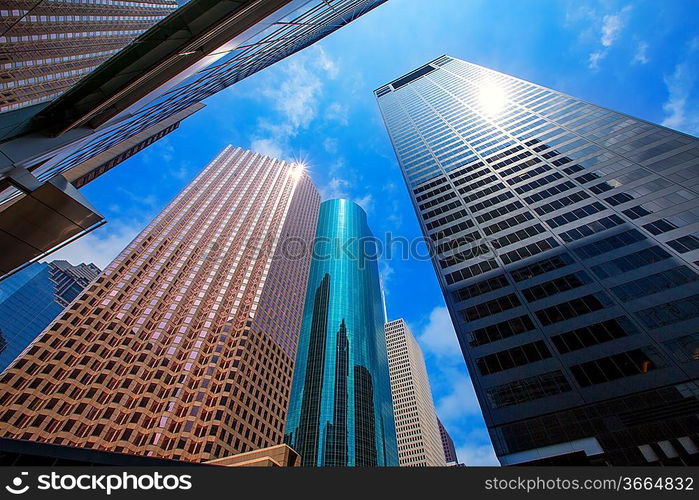 Houston downtown skyscrapers disctict with mirror blue sky reflection