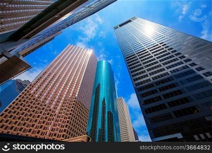 Houston downtown skyscrapers disctict with mirror blue sky reflection