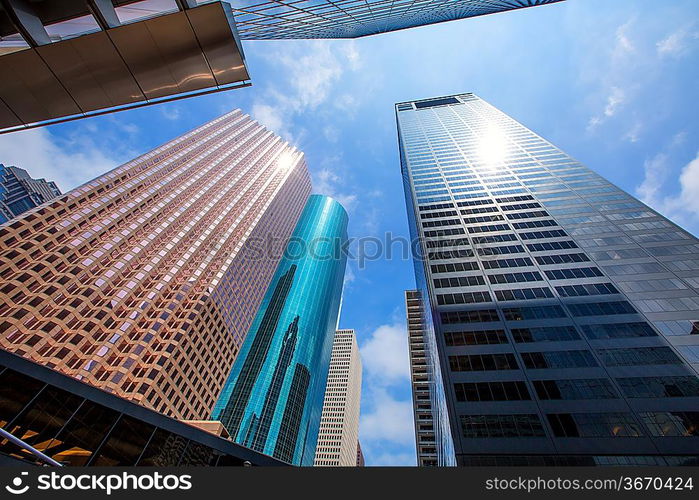 Houston downtown skyscrapers disctict with mirror blue sky reflection