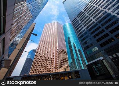 Houston downtown skyscrapers disctict with mirror blue sky reflection
