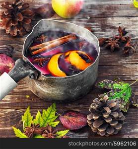 Hovering pot of sangria in the autumn still life. alcoholic beverage with wine