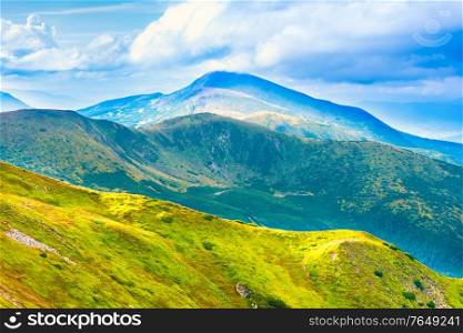 Hoverla mountain peak nature landscape with fog, clouds and mist
