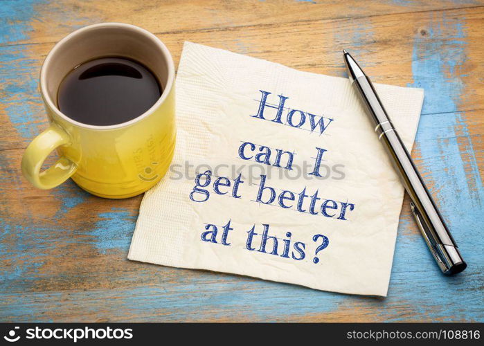 How can I be better at this? Handwriting on a napkin with a cup of espresso coffee