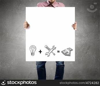 How to increase your income. Businessman holding banner with drawn money earning concept