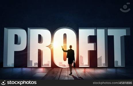 How to increase your profit. Back view of businesswoman standing in light of profit concept