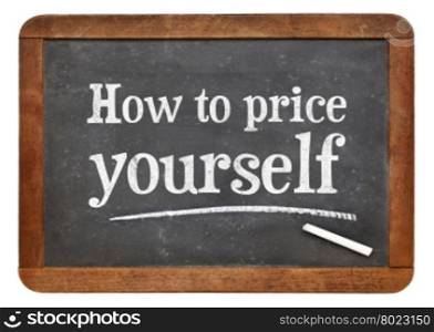 How to price yourself - white chalk text on a vintage slate blackboard