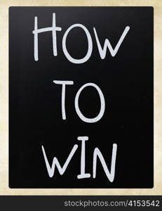 ""How to win" handwritten with white chalk on a blackboard"