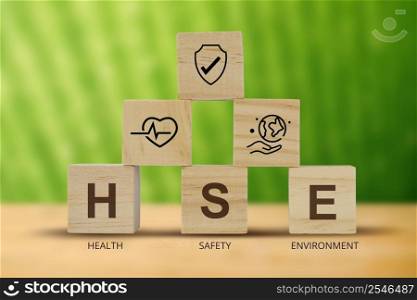 HSE on word letters cube, Health Safety Environment acronym, illustration.