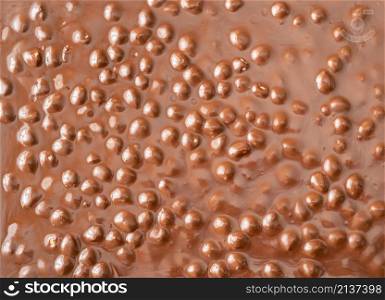 Huge milk chocolate bar with whole huzelnuts