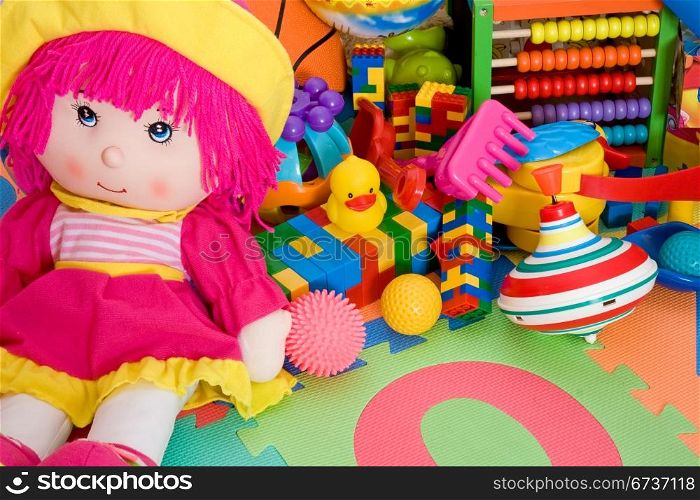huge pile of various colorful children&rsquo;s toys
