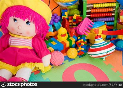 huge pile of various colorful children&rsquo;s toys