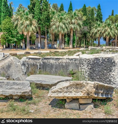 Huge stone blocks of the Ancient Theatre in the greek city of Miletus in Turkey on a sunny summer day. Huge stone blocks of the Ancient Theatre