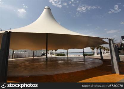 huge white tent as an umbrella