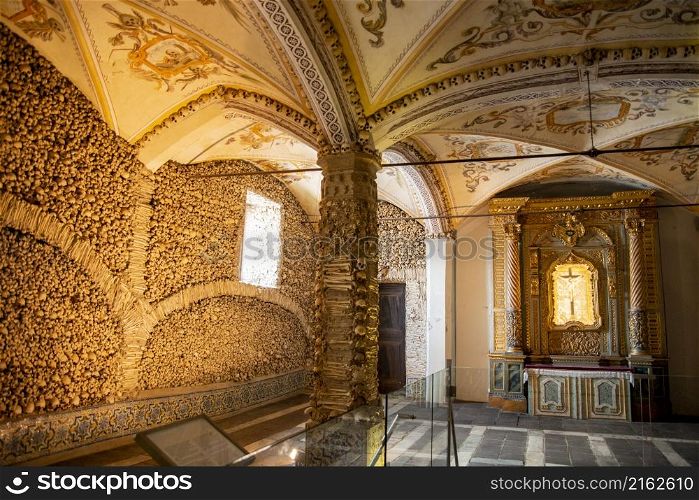 Human Bones at the Capela dos Ossos at the St Francis Church or igreja de Sao Francisco in the old Town of the city Evora in Alentejo in Portugal. Portugal, Evora, October, 2021