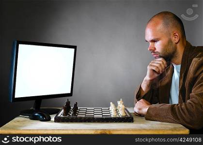 human chess player against computer on gray background
