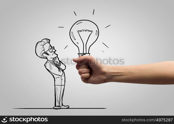 Human hand and caricature of funny thoughtful man