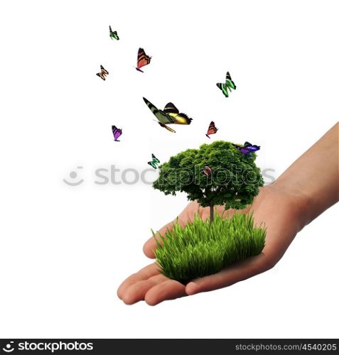 Human hand and multicolored butterflies, grass and a symbol of the environment. Collage.