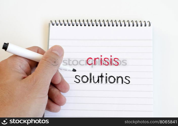 Human hand and notepad over white background