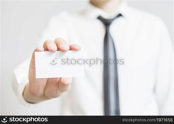 human hand holding blank business card. High resolution photo. human hand holding blank business card. High quality photo