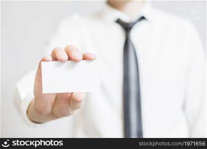 human hand holding blank business card. High resolution photo. human hand holding blank business card. High quality photo