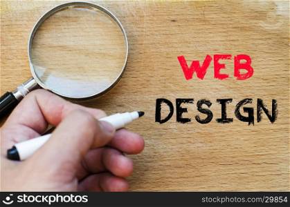 Human hand over wooden background and web design text concept