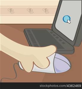 Human hand using a laptop