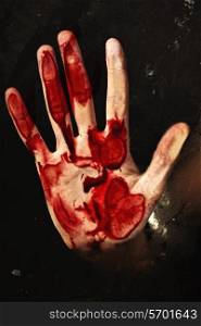 Human hand with blood. Halloween theme.
