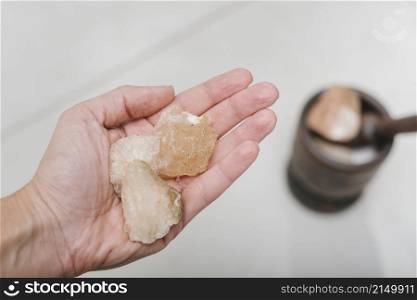 human hand with himalayan salt