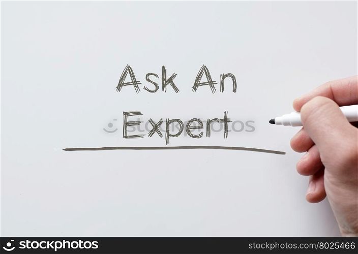 Human hand writing ask an expert on whiteboard