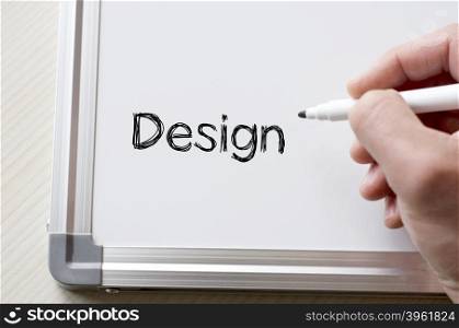 Human hand writing design on whiteboard