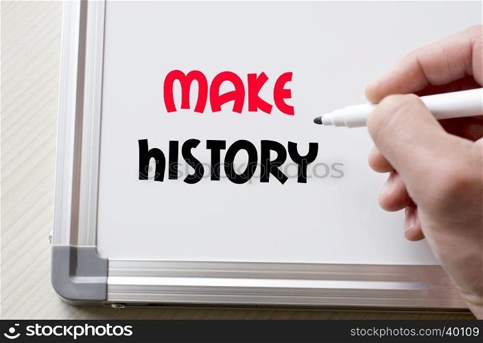 Human hand writing make history on whiteboard