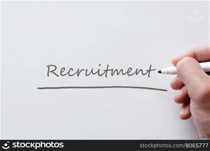 Human hand writing recruitment on whiteboard