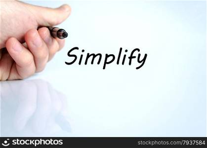 Human hand writing Simplify isolated over white background - business concept