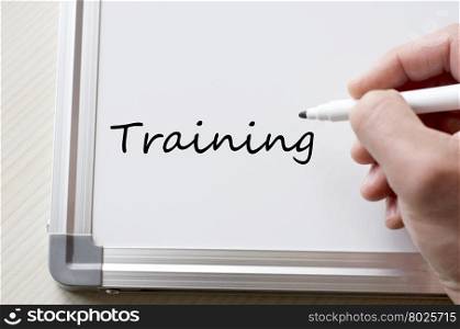 Human hand writing training on whiteboard