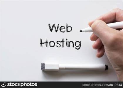 Human hand writing web hosting on whiteboard